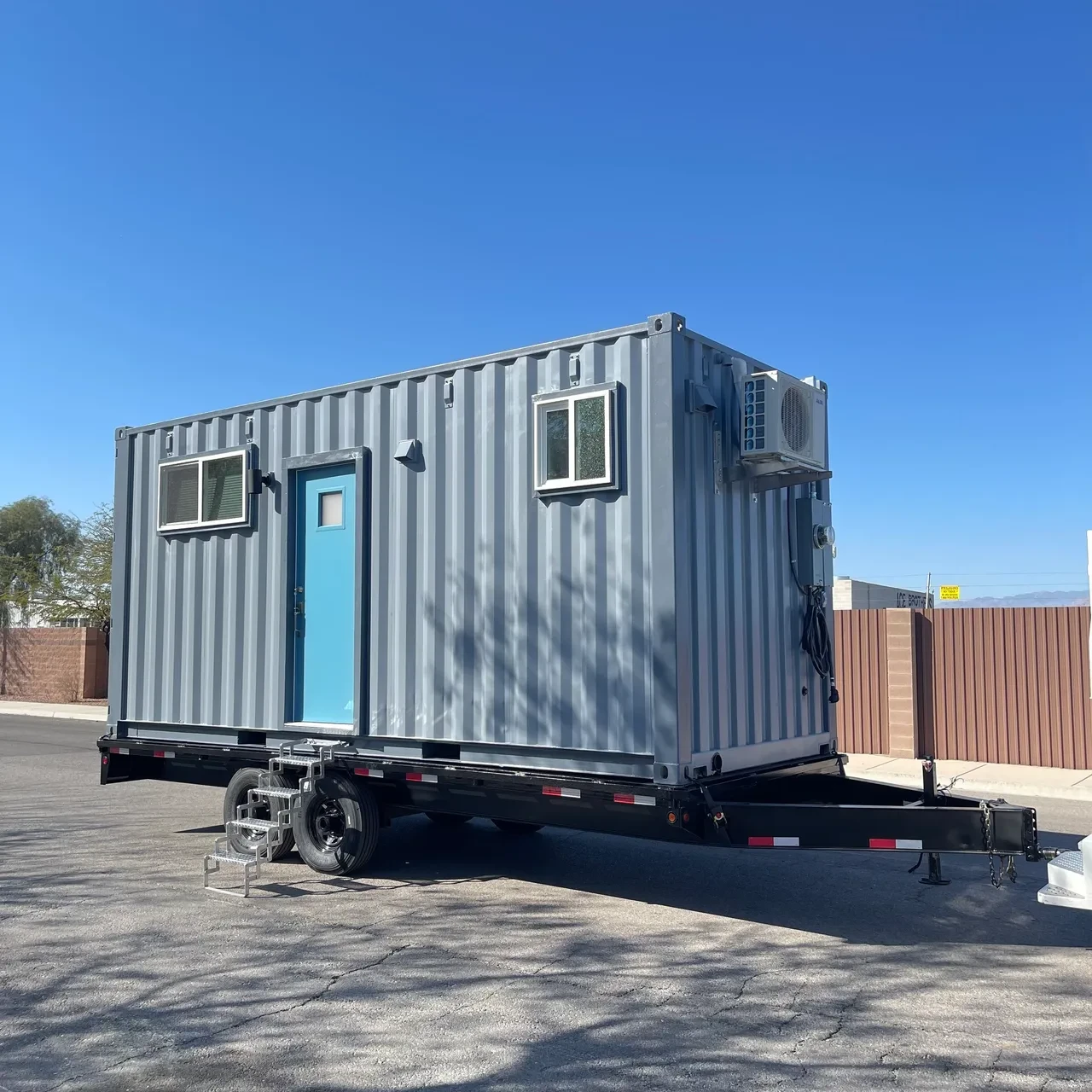 Container home with deck and outdoor patio living area